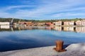 Erandio houses with Nervion river, bollard and cranes