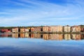 Erandio houses with Nervion river reflections Royalty Free Stock Photo