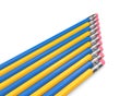 Eraser ends of blue and yellow pencils in a row Royalty Free Stock Photo