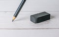 Eraser and error concept, Eraser and pencil on white table Royalty Free Stock Photo