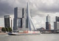 Erasmus Bridge and Container Ship Cargo Ship on Nieuwe Maas ri