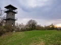 The Erben`s lookout tower - ERBENOVA VYHLÃÂDKA, on the top of the hill . On the oval shield is the coat of arms of the city Royalty Free Stock Photo