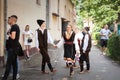 ERDEVIK, SERBIA - JUNE 3, 2023: Young woman and man rehearsing and dancing serbian kolo wearing a traditional Serbian costume in