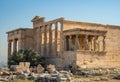 Erechtheion - an ancient Greek temple with a portico and six caryatids, built in honor of Athens and Poseidon, Greece Royalty Free Stock Photo