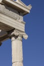 Erechtheion, Temple of Athena Polias on Acropolis of Athens, Greece. Details of Ionic style columns on a background of blue sky Royalty Free Stock Photo