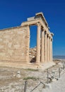 Ancient Erechtheion temple with Caryatid Porch on Acropolis, Athens, Greece. Famous Acropolis hill is top landmark of Athens. Royalty Free Stock Photo