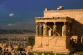 The Erechtheum temple stone porch with caryatids in Erechtheion in Acropolis, Athens in Greece with city view