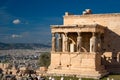 The Erechtheum temple stone porch with caryatids in Erechtheion in Acropolis, Athens in Greece with city view Royalty Free Stock Photo