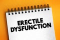 Erectile Dysfunction - is defined by difficulty getting and keeping an erection, text concept on notepad Royalty Free Stock Photo