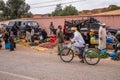 Erfoud, Morocco - Oct 19, 2019: local residents at the Road of a Thousand Kasbahs in their activities on the streets Royalty Free Stock Photo