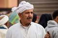 Erfoud, Morocco - Oct 19, 2019: local residents at the Road of a Thousand Kasbahs in their activities on the streets Royalty Free Stock Photo