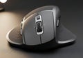 Ergonomic computer mouse on dark textured surface Royalty Free Stock Photo