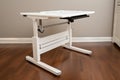 ergonomic desk with adjustable height, position, and tilt