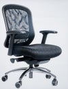 Ergonomic office chair with mesh back and adjustable height, isolated on clean white background Royalty Free Stock Photo