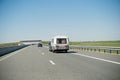 Eriba RV van and trailer driving fast to vacance