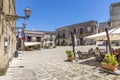 Sicilian souvenirs. Ancient, typical narrow and cobblestone street in Erice, Sicily, Italy