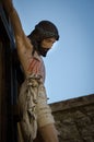 Jesus crucified statue and blue sky Royalty Free Stock Photo