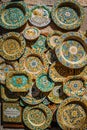 Erice, Sicily - June 8, 2021. Colorful hand-decorated ceramics. Traditional tourist suvenir. Street vendor with hand made crafts.