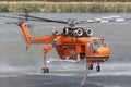 Erickson Air Crane helicopter N243AC Sikorsky S-64E sucking up a load of water to fight a bushfire in the Melbourne suburb of Bu Royalty Free Stock Photo