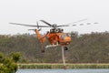 Erickson Air Crane helicopter taking off after filling with a load of water Royalty Free Stock Photo