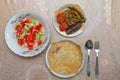 Hamirashi Erishde dish, badumcan stuffed dish and cucumber, tomato salad Azerbaijani dish