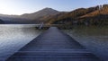 Erlaufsee - a mountain lake at the foot of the Alps in Lower Austria. Wooden pier leading from the edge of the lake to the middle