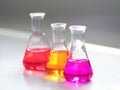 The Erlenmeyer or Conical flask on bench laboratory, with colorful solvent solution from titration experiment. Parameter of acid Royalty Free Stock Photo