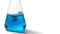 Erlenmeyer flask containing blue liquid against a white background Royalty Free Stock Photo