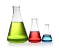 Erlenmeyer flasks with color liquids isolated Royalty Free Stock Photo