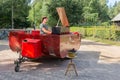 Dutch busker is playing at mobile piano near sheepfold Ermelo