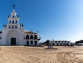 Ermita de Rocio church and town square with horses and riders