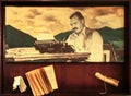 Ernest Hemingway with his typewriter and old book