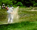 Ernie Els in the sand.