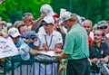 Ernie Els signs autographs Royalty Free Stock Photo