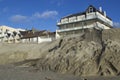 Eroded beach and constructions Royalty Free Stock Photo