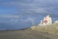 Eroded beach and constructions Royalty Free Stock Photo