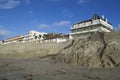 Eroded beach and constructions Royalty Free Stock Photo