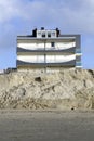 Eroded beach and constructions Royalty Free Stock Photo