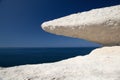 Eroded chalk rock white stone blue sky and sea