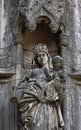 Eroded church building statue with Mary's child. Royalty Free Stock Photo