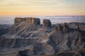 Eroded mesas and buttes in the arid terrain