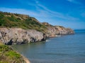 Eroded mudstone cliffs north of Sandsend in North Yorkshire, UK