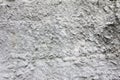 Eroded old grey concrete at a wall for dirty texture, background Royalty Free Stock Photo