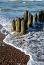 Eroded poles in the sea