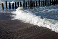 Eroded poles in the sea