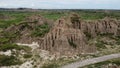 Eroded Rock Formations Shaped by Centuries of Wind and Water in Remote Badlands Landscape Royalty Free Stock Photo
