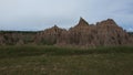Eroded Rock Pinnacles and Ridges in Remote Badlands Under Clear Blue Sky Royalty Free Stock Photo