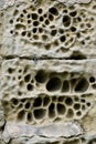 Eroded stone wall