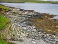 Eroded strata in sea cliffs on the west coast of Kettla Ness off the west coast of Mainland, Shetland. Royalty Free Stock Photo