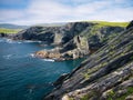 Eroded strata in sea cliffs on the west coast of Kettla Ness off the west coast of Mainland, Shetland. Royalty Free Stock Photo